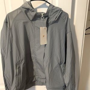 Brand new Fabletics rain jacket